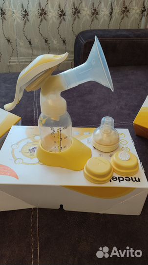 Молокоотсос ручной Медела+пакеты для хранения