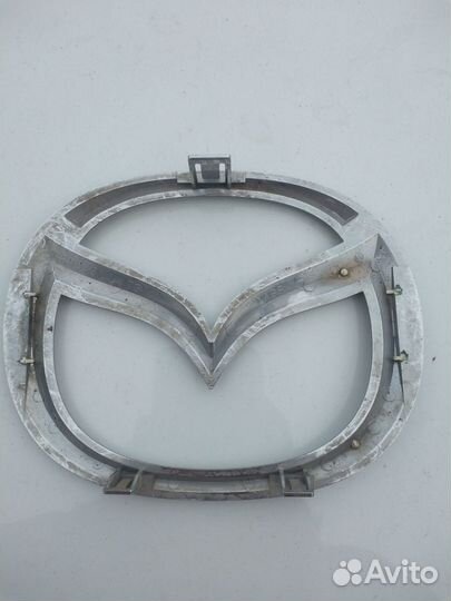 Эмблема Мазда