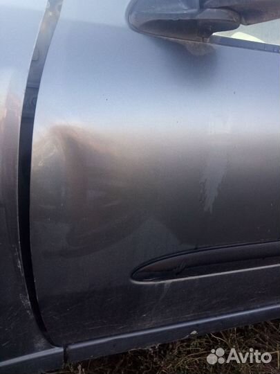 Дверь водительская Nissan Almera N16