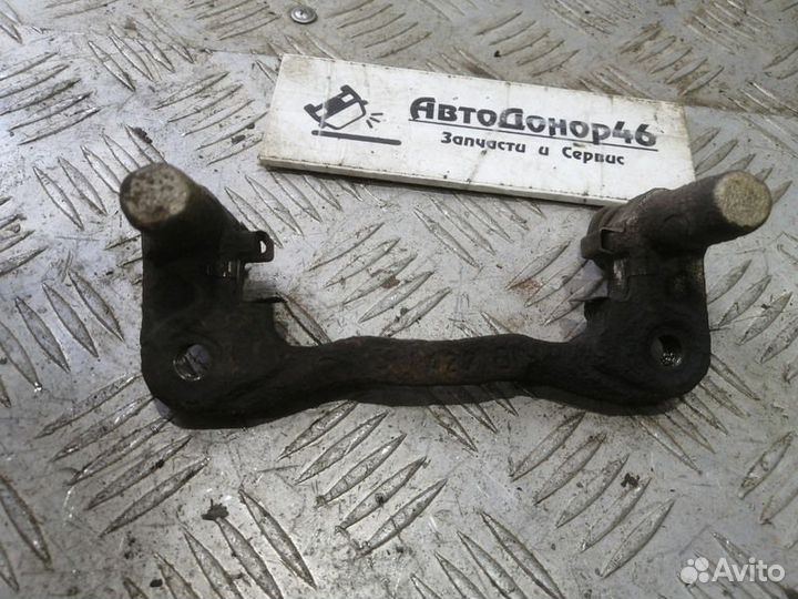 Скоба заднего правого суппорта Mitsubishi Lancer X