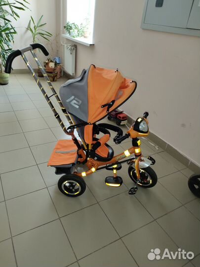 Трехколесный велосипед с родительской ручкой