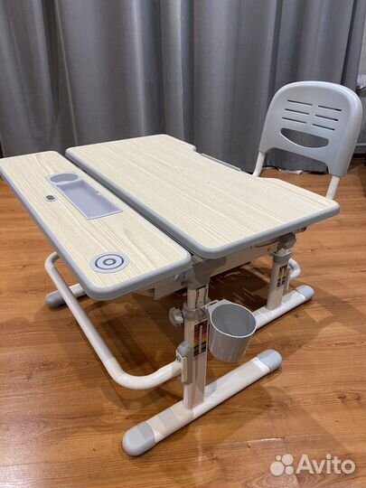 Расстущая парта