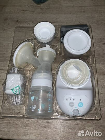 Электрический молокоотсос