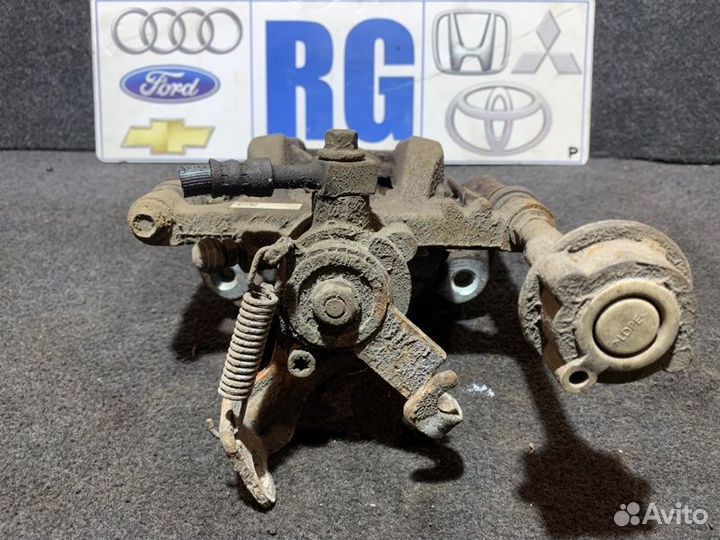 Суппорт задний правый Opel Astra J хэтчбек 1.4