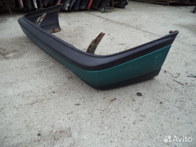 Бампер задний Ниссан Сани