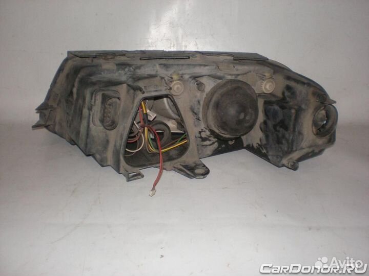Фара головного света правая б/у для Volkswagen Pas