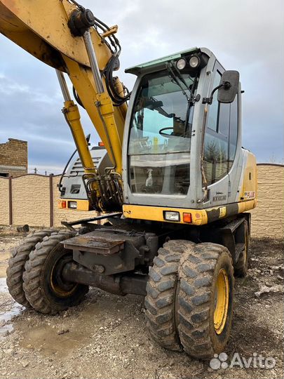 Колёсный экскаватор New Holland MH Plus, 2005