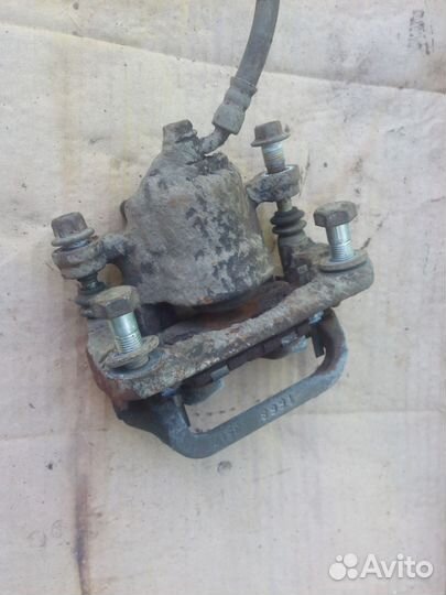 Суппорт тормозной Ниссан Теана 32