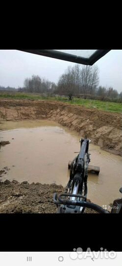 Услуги экскаватора погрузчика