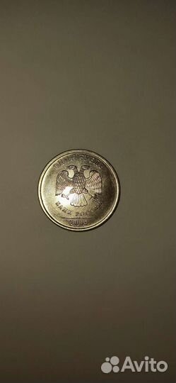Монета в 1 рубль с буквой Р