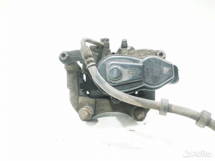 Суппорт тормозной задний левый Land Rover 4