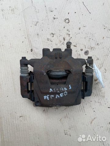 Суппорт передний левый Opel Astra J A16XER 2011