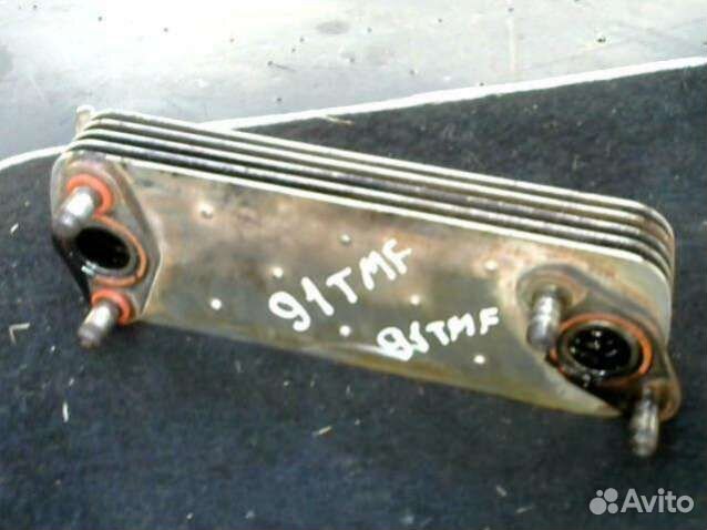 Теплообменник масляного фильтра Kia Carnival 1