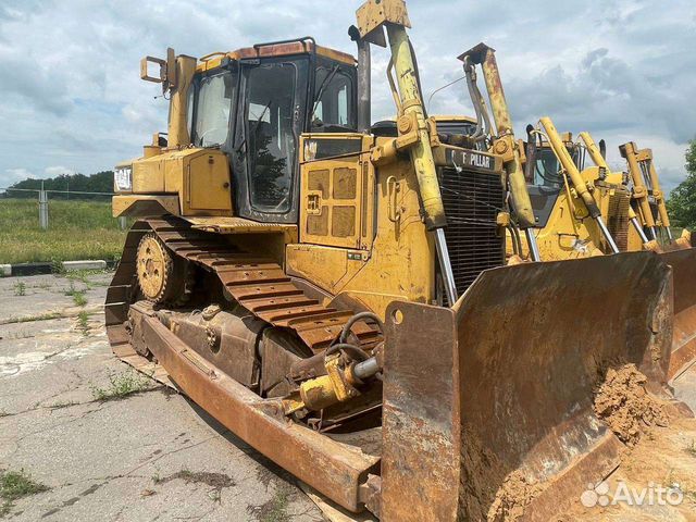 Машинист бульдозера и эскаватора