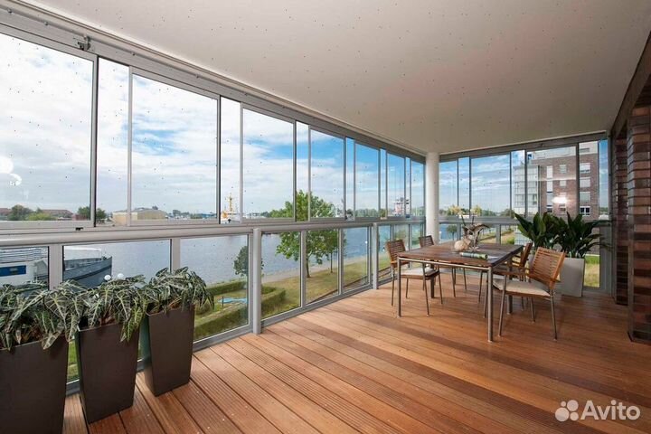 Пластиковые балконы с панорамным остеклением