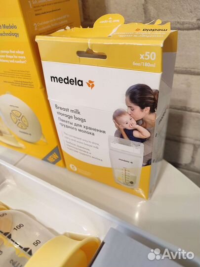 Молокоотсос medela swing maxi flex
