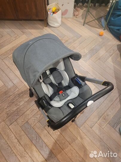 Коляска автокресло doona с базой isofix