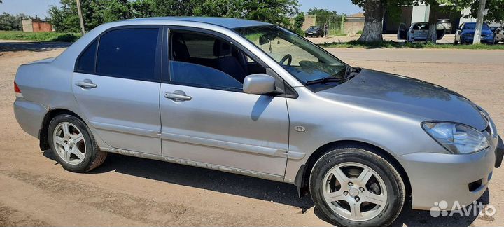 Mitsubishi Lancer 1.6 МТ, 2005, 195 000 км