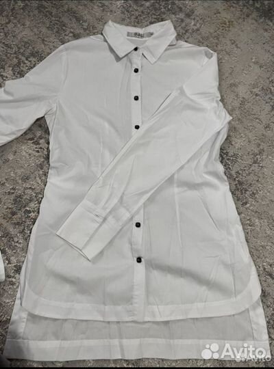 Продам красивую блузку на девочку Deloras