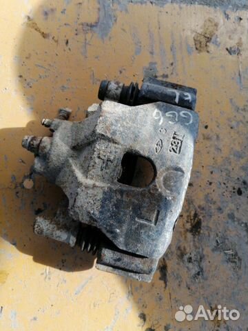 Суппорт передний левый Mazda Atenza GG