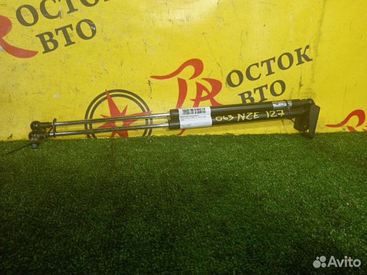 Амортизатор задней двери Toyota Will Vs NZE127