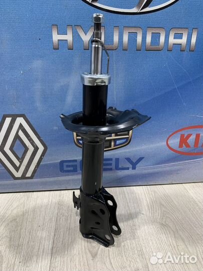 Амортизатор стойка перед Geely MK cross