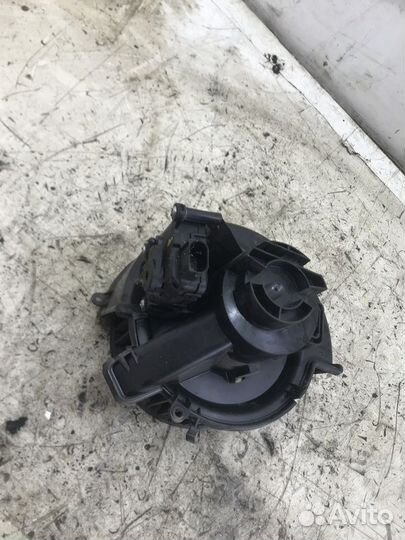 Моторчик отопителя Opel Astra