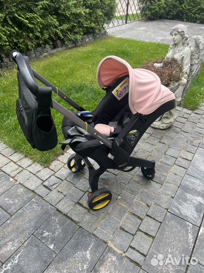 Коляска Doona+ blush pink (розовая) + isofix