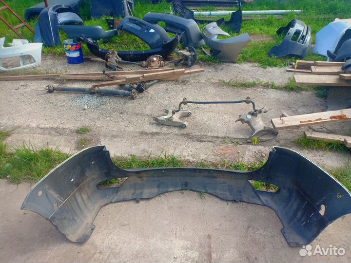 Бампер задний Mitsubishi Pajero Montero Sport