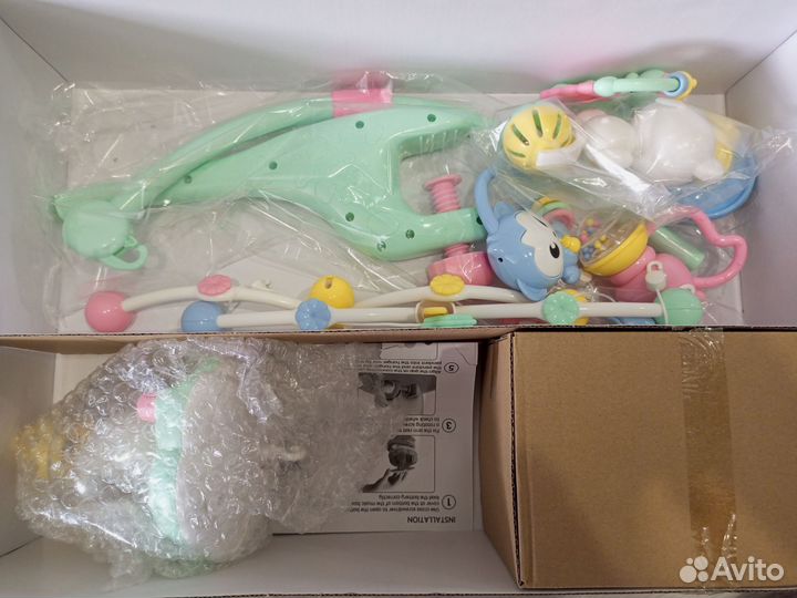 Детский мобиль в кроватку музыкальный