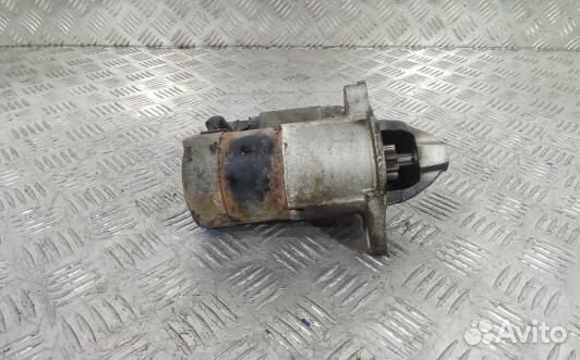 Стартер бензиновый mazda demio 1 (NSE07DF01)