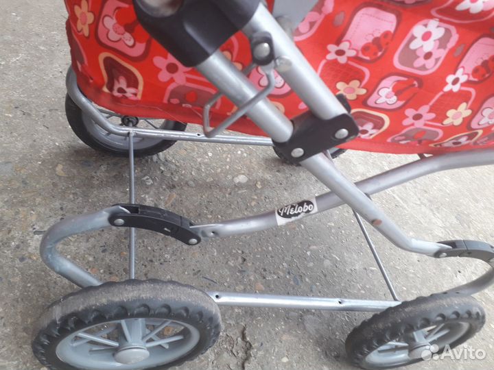 Игрушечная коляска для кукол