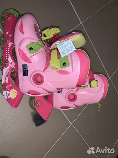 Роликовые коньки