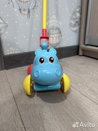 Игрушка-каталка бегемот