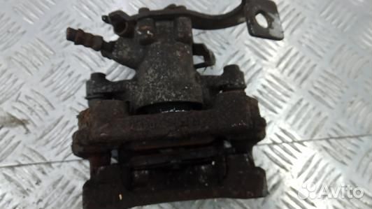 Суппорт тормозной задний правый toyota auris E150