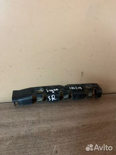 Кронштейн бампера правый Logan