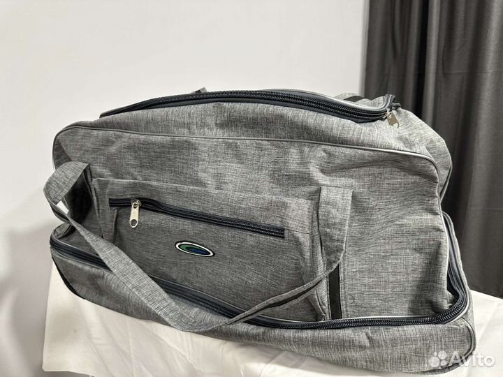 Сумка дорожная на колесах с выдвижной ручкой