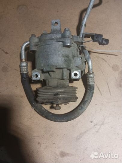 Компрессор кондиционера лансер 10