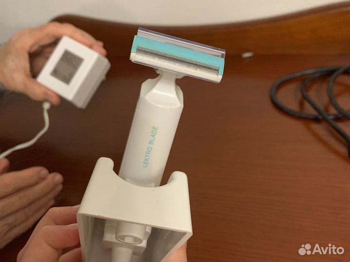 Электрическая бритва женская
