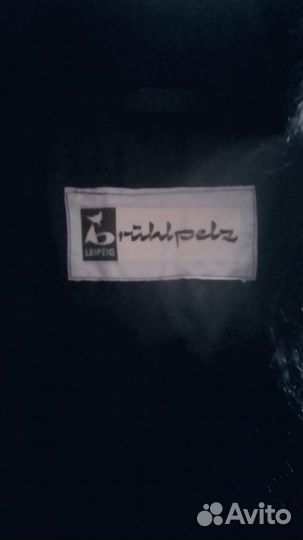 Шуба из меха ламы черного цвета