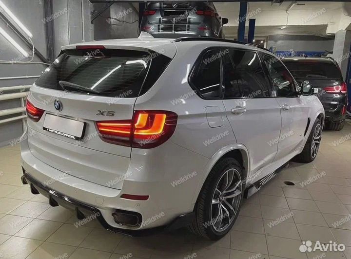 Лезвия BMW X5 F15 в стиле G05 черный глянец