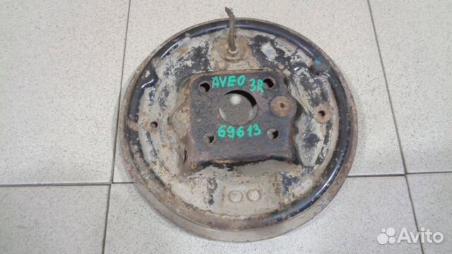 Щит опорный задний правый Chevrolet Aveo (T250)