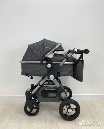 Прогулочная коляска 3 в 1
