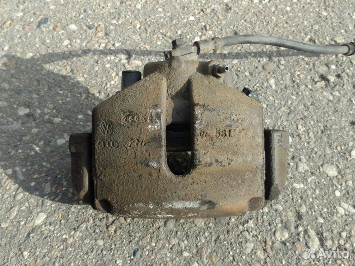 Суппорт передний правый Volkswagen Passat B6 1.9