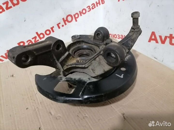 Передний левый поворотный кулак Nissan Presage