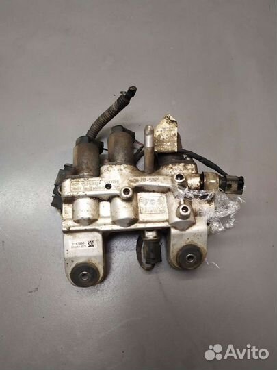 Блок клапанов активной подвески Porsche Cayenne