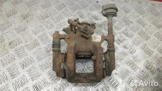 Суппорт тормозной задний левый opel astra J (SEA04