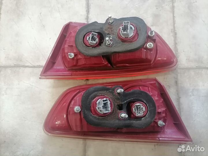 Фонарь крышки багажника Mitsubishi Lancer 10