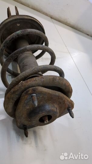 Амортизатор подвески левый передний Mitsubishi Lancer 9