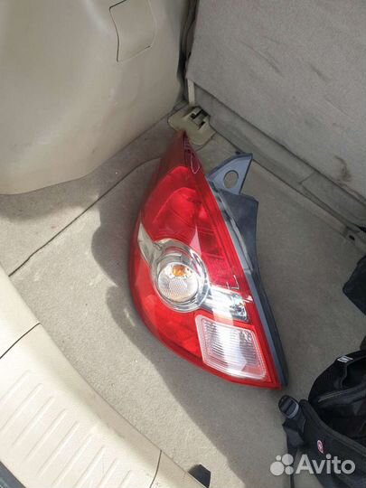 Задний левый фонарь Nissan Tiida C11